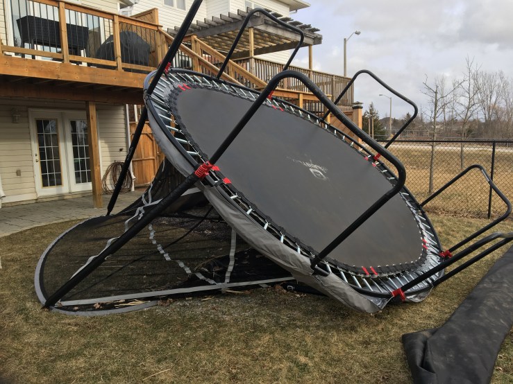trampoline flipped over after a wind storm